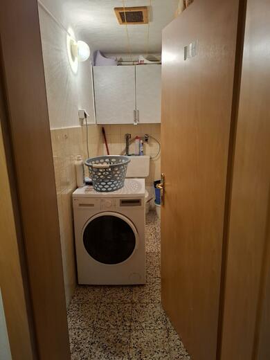 sušárna a WC na chodbě